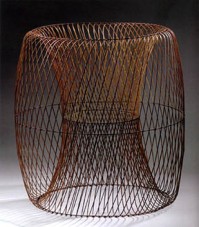 Ueno Masao, Rotation of Ellipse Makes Two Transparent Drums, 2004. Bamboo (madake), rattan, lacquer, and gold powder. Photo by Susan Einstein.
